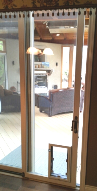 Hale Pet Door brand dog door installed through a sliding glass door